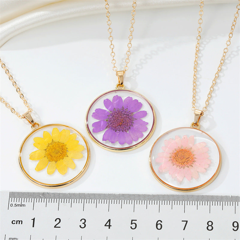 Read Pressed Flower Resin Pendant Necklace