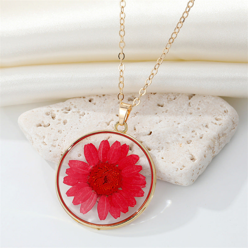 Read Pressed Flower Resin Pendant Necklace