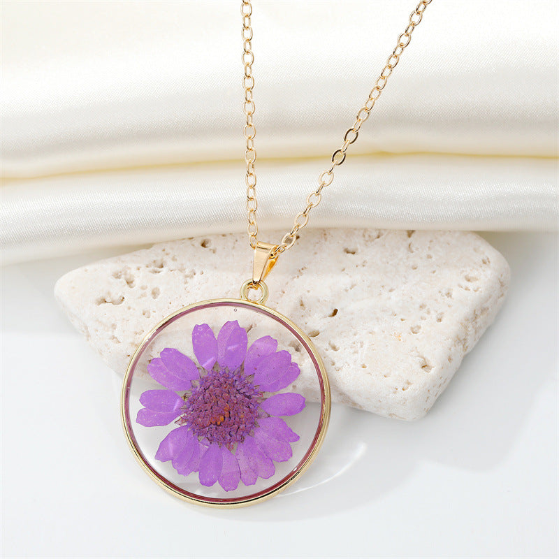 Read Pressed Flower Resin Pendant Necklace