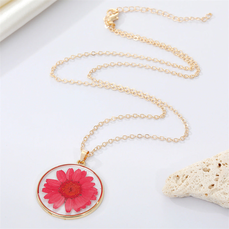 Read Pressed Flower Resin Pendant Necklace