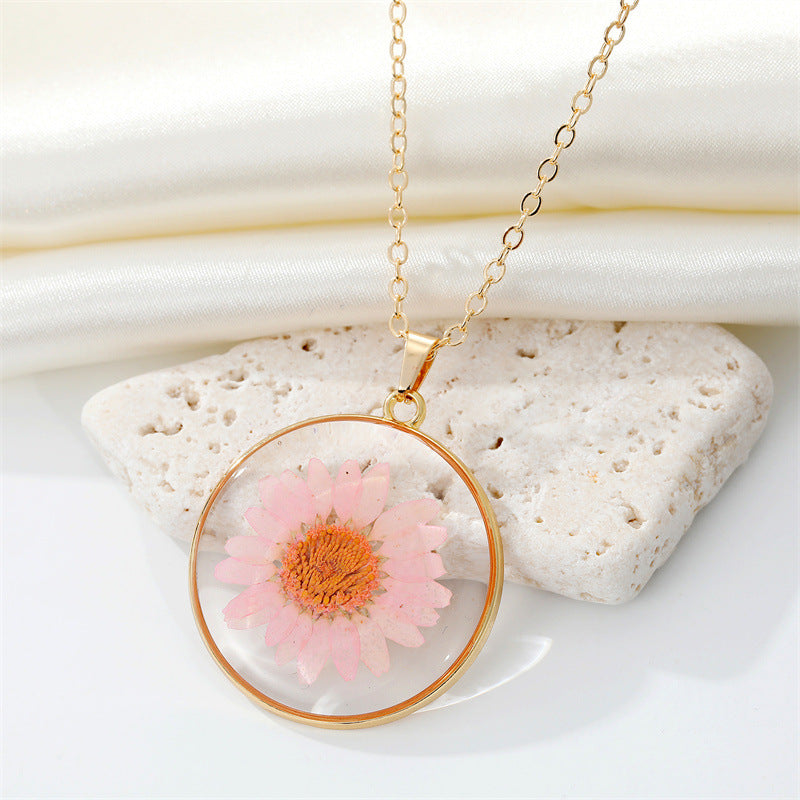 Read Pressed Flower Resin Pendant Necklace