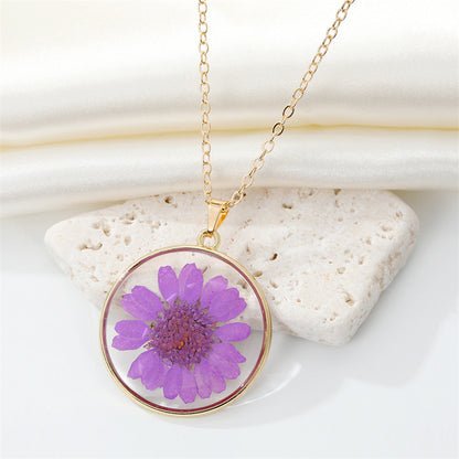 Read Pressed Flower Resin Pendant Necklace