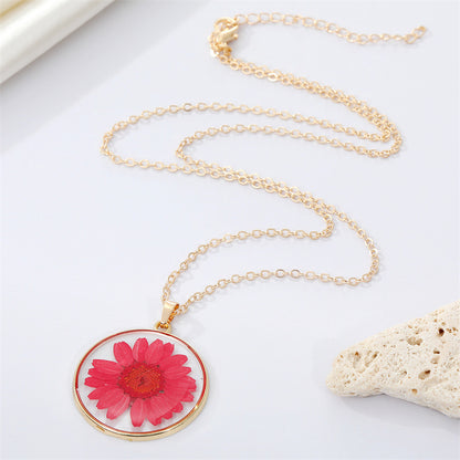 Read Pressed Flower Resin Pendant Necklace