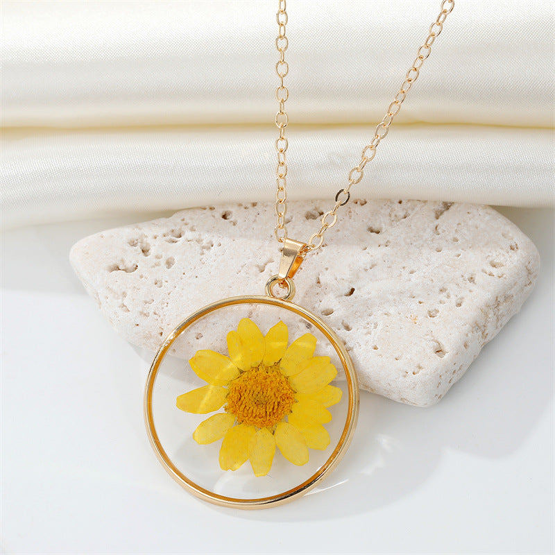 Read Pressed Flower Resin Pendant Necklace