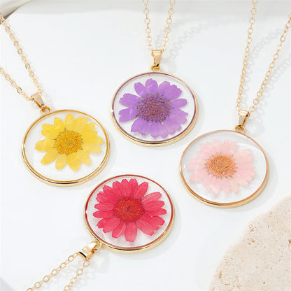 Read Pressed Flower Resin Pendant Necklace