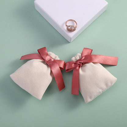 Plush Bow Jewelry Pouch