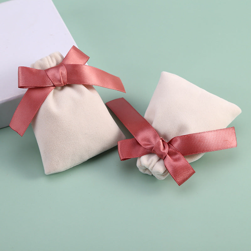 Plush Bow Jewelry Pouch