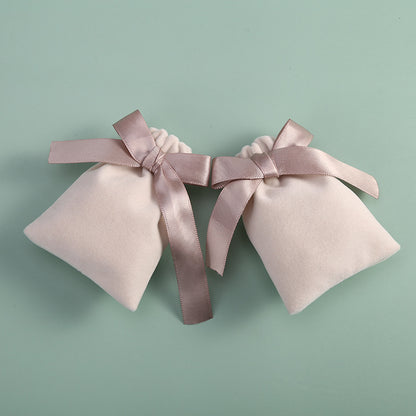 Plush Bow Jewelry Pouch