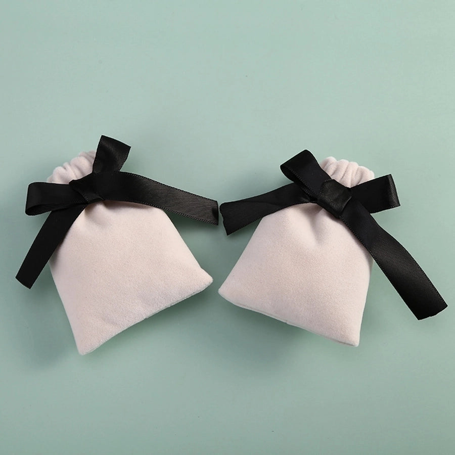 Plush Bow Jewelry Pouch